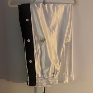 Nike White Satin Track Pants with Black Side Panels and Gold Logo